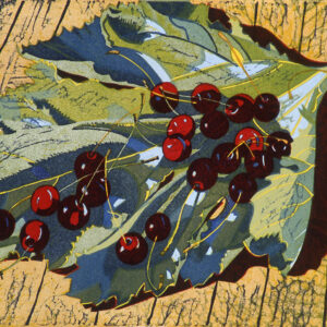 Cherries on a leaf